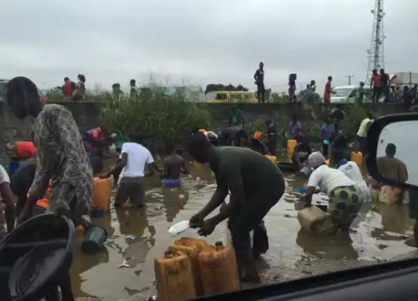 More Photos Of People Scooping Fuel From Fallen Tanker In Ibafo, Ogun